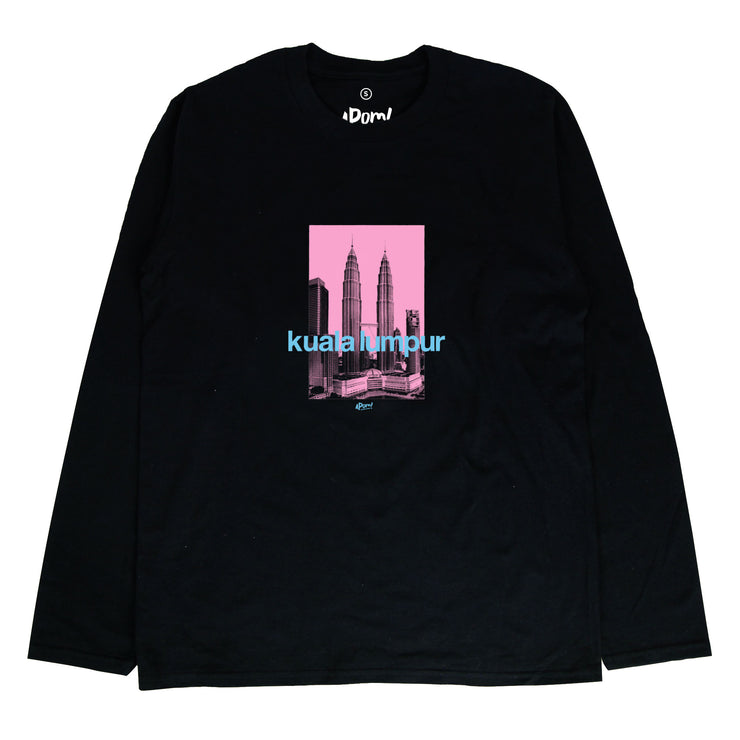 The Petronas Twin Towers once stood as the tallest towers in the world. Stand tall with this KLCC street tee. If you want to bring home a piece of Malaysia this is a must have souvenir . Pink silkscreen design of the twin towers on a black long sleeve T