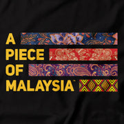 Close up of the Malaysia Logo by Apom. Malaysia’s multicultural unity is captured in this Tee. Featuring the A piece of Malaysia logo made up of the traditional fabric of the Malay, Chinese, Indian and Native East Malaysians.