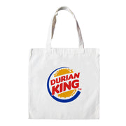 This White tote bag is emblazon with the Burger King Logo which upon further inspection reads. “Durian King.” It is the perfect Malaysian souvenir and even a street fashion statement. Capturing Apom’s trademark tongue in cheek humour and arguably Malaysia’s most love it or hate it icon. The king of all fruits; the durian!